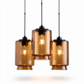 Suspension en verre marron avec trois ampoules pour une utilisation décorative